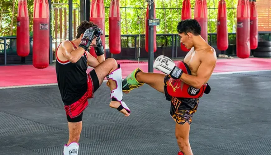 Muay Thai training in Koh Samui gym with fighters sparring – authentic Thai boxing experience in Thailand.