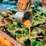 Food stall at Koh Samui night market with traditional Thai street food and vibrant local flavors.